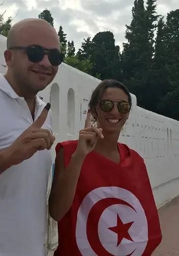 Tunisian voters display inked fingers indicating they&#039;ve voted in the September 15, 2019, presidential election.