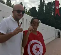 Tunisian voters display inked fingers indicating they&#039;ve voted in the September 15, 2019, presidential election.