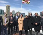 Baltimore, MD - After meeting with representatives from Safe Streets, the delegates took advantage of the good weather to pose for a photo with Maryland’s state flag before they headed to a meeting at the district office of U.S. Congressman Jamie Raskin.