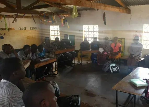 International Group Association (IGA) Accountability Club discussing health monitoring in Lilongwe Rural