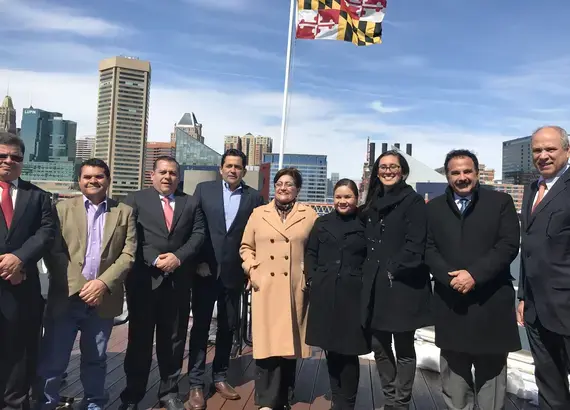 Baltimore, MD - After meeting with representatives from Safe Streets, the delegates took advantage of the good weather to pose for a photo with Maryland’s state flag before they headed to a meeting at the district office of U.S. Congressman Jamie Raskin.